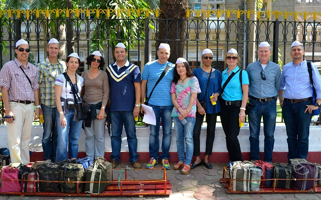 Meet Dabbawala, Visit Dhobi Ghat & Dharavi Slum Tour with Local Train Ride